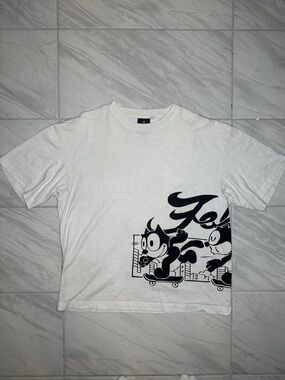 H&M White Short-Sleeve Tee with Black Cartoon Skate Print